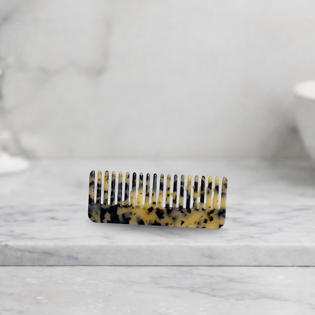 GM wide-tooth ivory comb